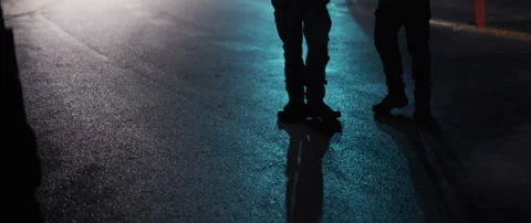 Two policemen guarding protests at night Stock Footage 152840705