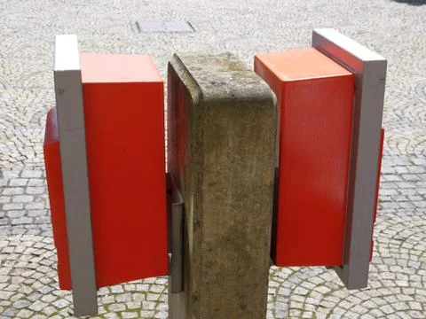 Two postboxes taken in profile Stock Photos