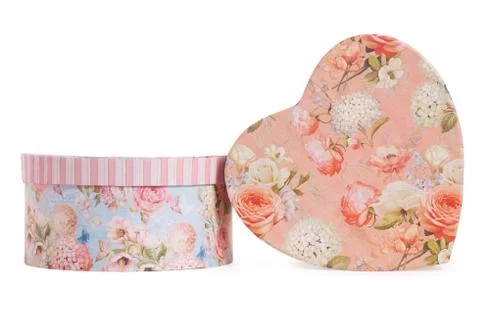 Two present box round and heart-shaped isolated on white background Foto stock