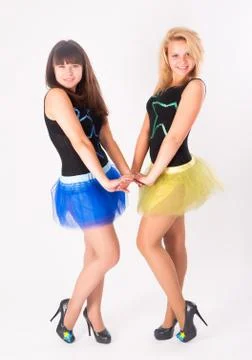 Two pretty girls dancing Stock Photos