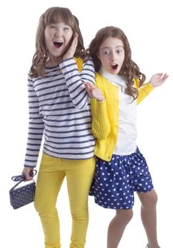 Two pretty surprised teengirls Stock Photos