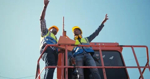 Two professional african industrial engineers wearing safety uniform 스톡 동영상 166991904