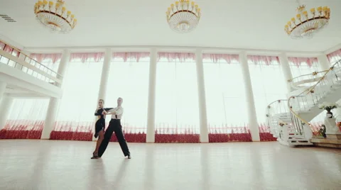 Two professional dancers dance with elements of acrobatics Stock Footage 64296811