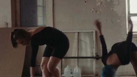 Two Professional Dancers Practice in Large Warehouse Stock Footage 81631680