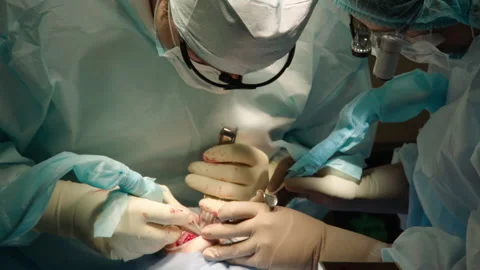 Two professional doctors perform dental surgery Stock Footage 236055842