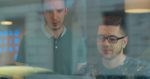 Two Professional IT Programers Discussing Technical Data Show on Computer Stock Footage 137173015