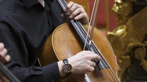 Two professional man play violin while performance on stage of theater. Stock Footage 119889992