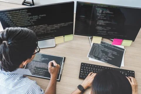 Two professional programmers cooperating at Developing programming and websit 스톡 사진