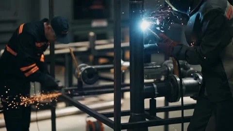 Two professional welders Stock Footage 255213990