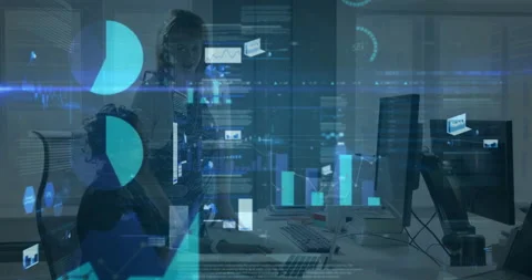 Two professional women collaborating in tech office, presenting holographic Stock Footage 308603366