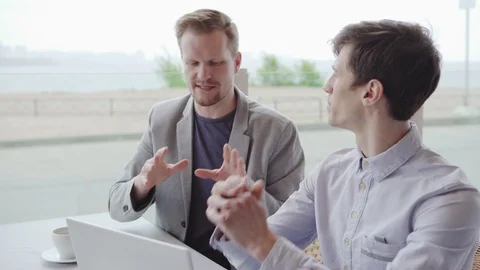 Two professionals planning project in cafe Stock Footage 111757824