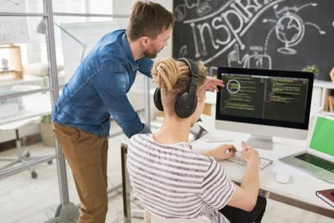 Two Program Developers Working on Project Stock Photos