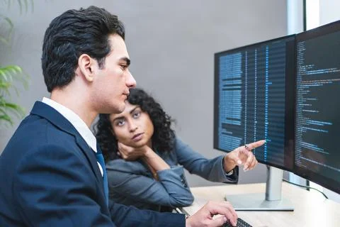 Two programmer is dealing with the stress and anxiety of working on compute.. 写真素材