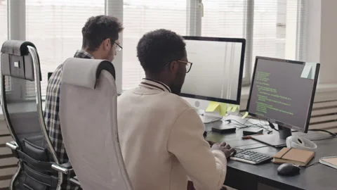 Two Programmers Working in Office Stock Footage 165214258