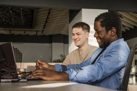 Two programmers working in the office of a software development company. Coding 스톡 사진