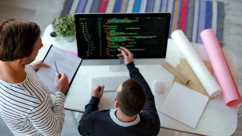 Two Programmers Working Together Stock Footage 101326085