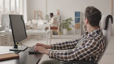 Two Programmers Working Together in Office Stock Footage 165217953