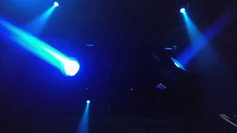 Two projectors on the ceiling of the techno club blink and rotate Video stock 88208276