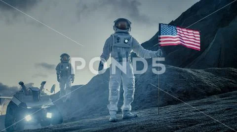 Two Proud Astronauts Plant American Flag on the Alien Planet. Stock Photos