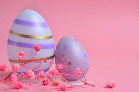 Two Purple Easter eggs on a purple background. Easter. Stock Photos