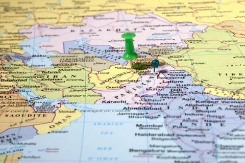 Two push pins on map Stock Photos