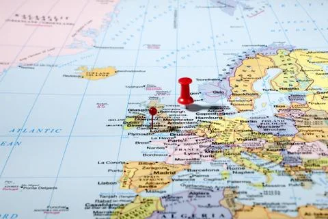 Two push pins on world map Stock Photos