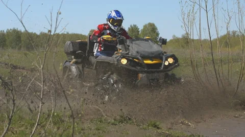 Two quad bikes in the mud Stock Footage 55250646