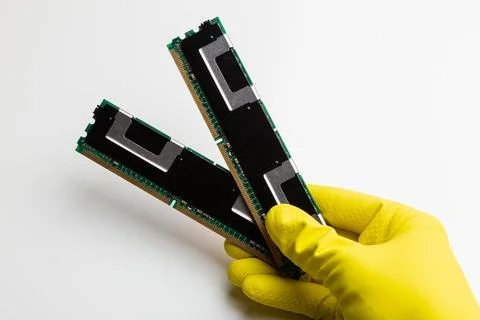 Two radiator server memory RAM planks in hand Stock Photos