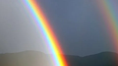 Two Rainbow over Sky and Mountain Stockbeeldmateriaal 204973366