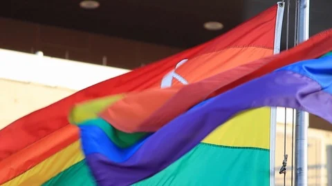 Two Rainbow Pride Flags Blow Together Vídeo Stock 105146549