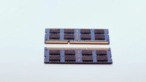 Two ram chips on white Stock Footage 302387627