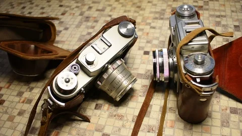 Two rangefinder retro cameras Stock Footage 122562930