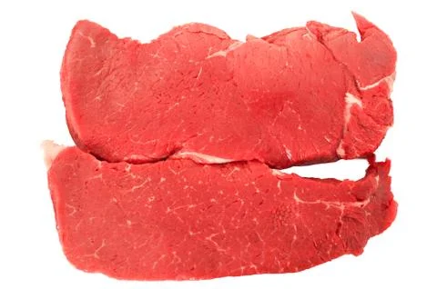 Two raw beef steaks isolated on white background Stock Photos