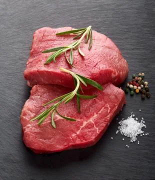 Two raw beef steaks Stock Photos