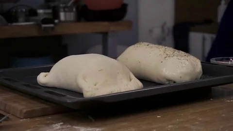 Two raw beef wellingtons Stock Footage 79508054