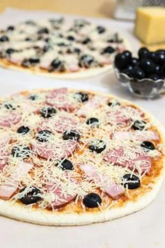 Two raw meat pizza Stock Photos