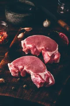 Two raw pork loin steaks Stock Photos