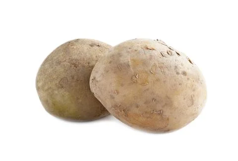Two raw potatoes isolated on white background. Stock Photos