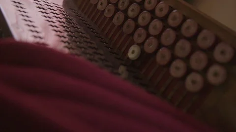 Two red accordions laying on table Vídeos de archivo 89343455