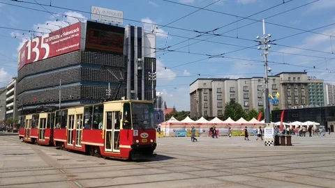Two red and white (old and new) electric trains from the city of Katowice. 動画素材 92593903