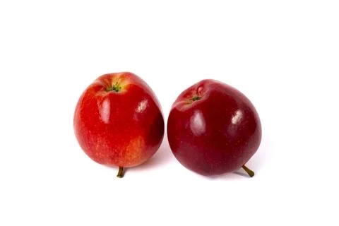 Two red apples isolated on white background. Clean minimal food photography with Stock Photos
