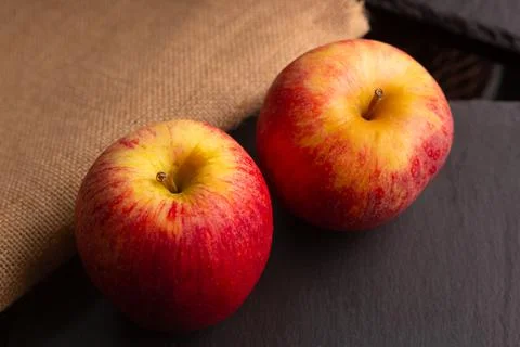 Two red apples Stock Photos