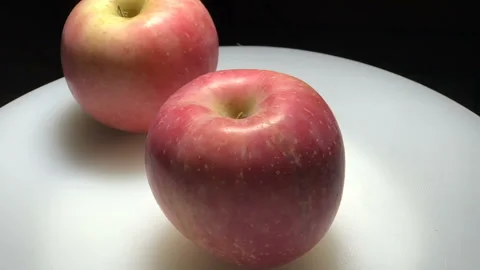 Two red apples rotated with white background Stock-Footage 93011349