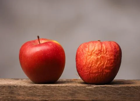 Two red apples on table Stock Photos