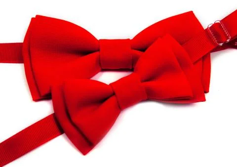 Two red bow tie on an isolated white background. Big and small for dad and child Stockfoto's