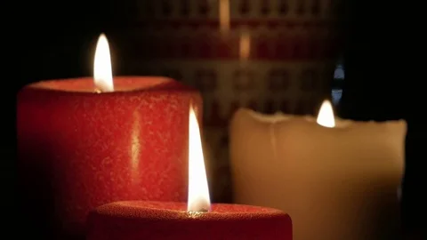 Two red candles burn Видео 84852921