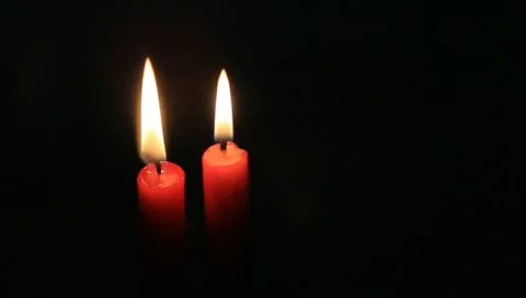 Two red candles Stock Footage 11022324