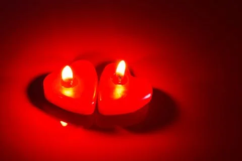 Two red candles Stock Photos