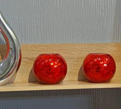 Two red candles Stock Photos