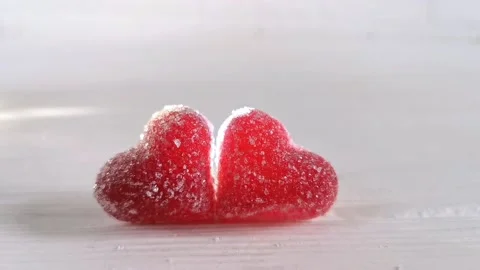 Two red candy heart, white background with light, concept of love Valentines Day Stock Footage 227341124